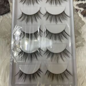 The Makeup Institute Faux Lashes.  New in package.  Excellent condition.